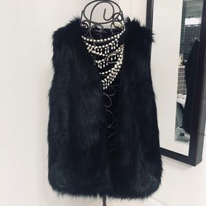 Black faux fur vest
